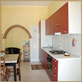 Ingrandisci
